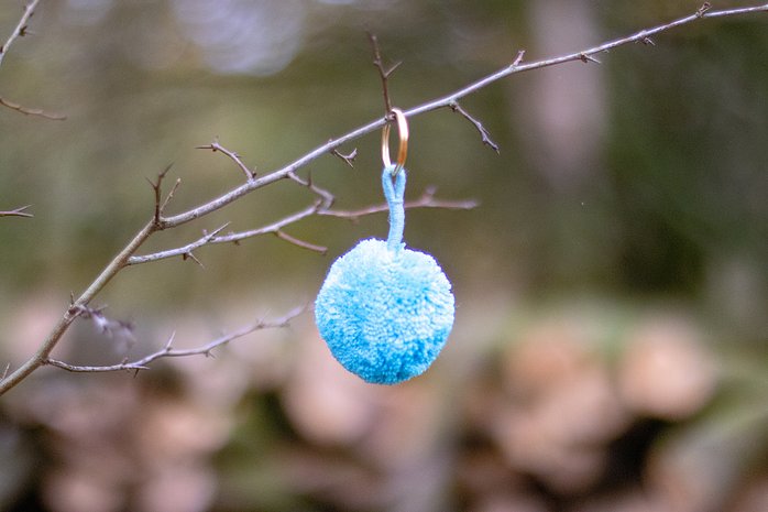 Single Pom Keyring in Light Blue